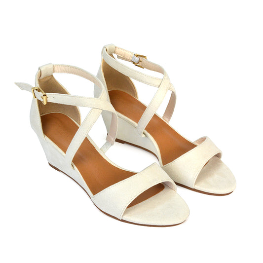 nude strappy wedge heel sandals- wedge heels are a staple when it comes to adding the finishing touches to your holiday outfits.