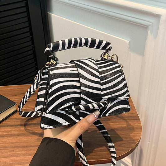 Statement mini purse with zebra design and crossbody strap, Lightweight small handbag for travel and shopping