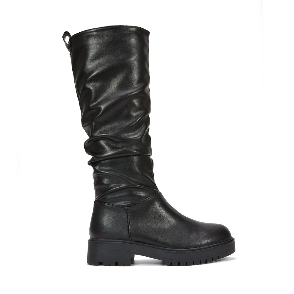 black synthetic knee high boots