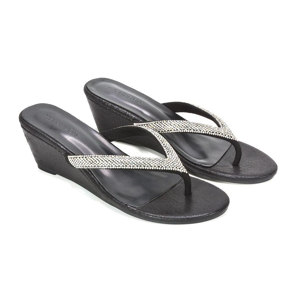 comfortable black wedge flip flops for everyday wear, black embellished low heel summer sandals, elegant black wedge sandals for special occasions, elegant black glitter flip flop sandals with low heel