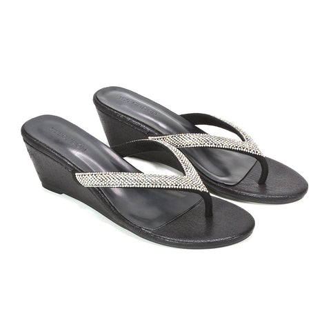 comfortable black wedge flip flops for everyday wear, black embellished low heel summer sandals, elegant black wedge sandals for special occasions, elegant black glitter flip flop sandals with low heel