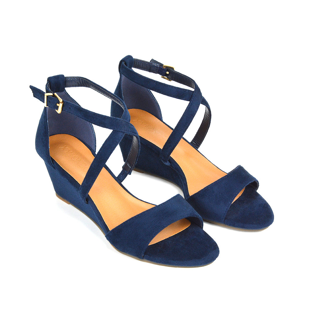 navy strappy wedge heel sandals- wedge heels are a staple when it comes to adding the finishing touches to your holiday outfits. 