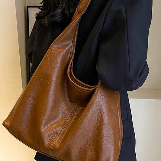 tan shoulder bag, tan slouchy shoulder bag, shoulder bag, slouchy shoulder bag