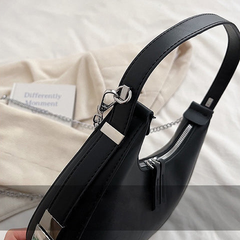 black curved shoulder bag, black mini shoulder bag, mini shoulder bag, curved shoulder bag