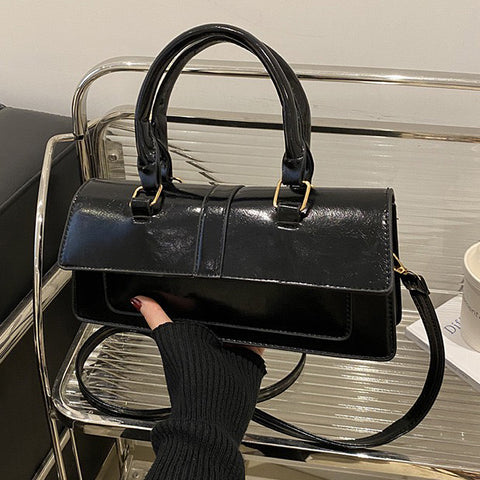 black party handbags, black top handle bags, party handbags, top handle bags