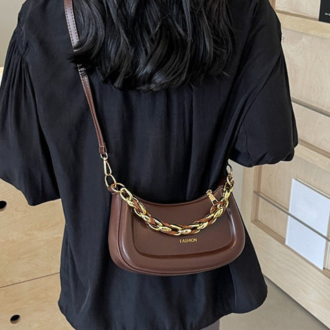 brown handbag with statement chain, brown chain detail handbag, handbag with statement chain, chain detail handbag, Stylish mini handbag for day and night wear