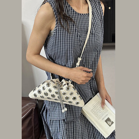 beige crossbody bag, beige eyelet crossbody bag