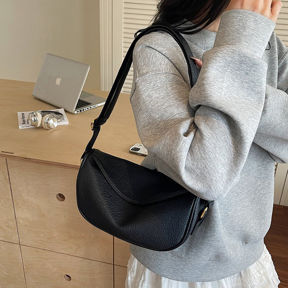 black adjustable strap bag
