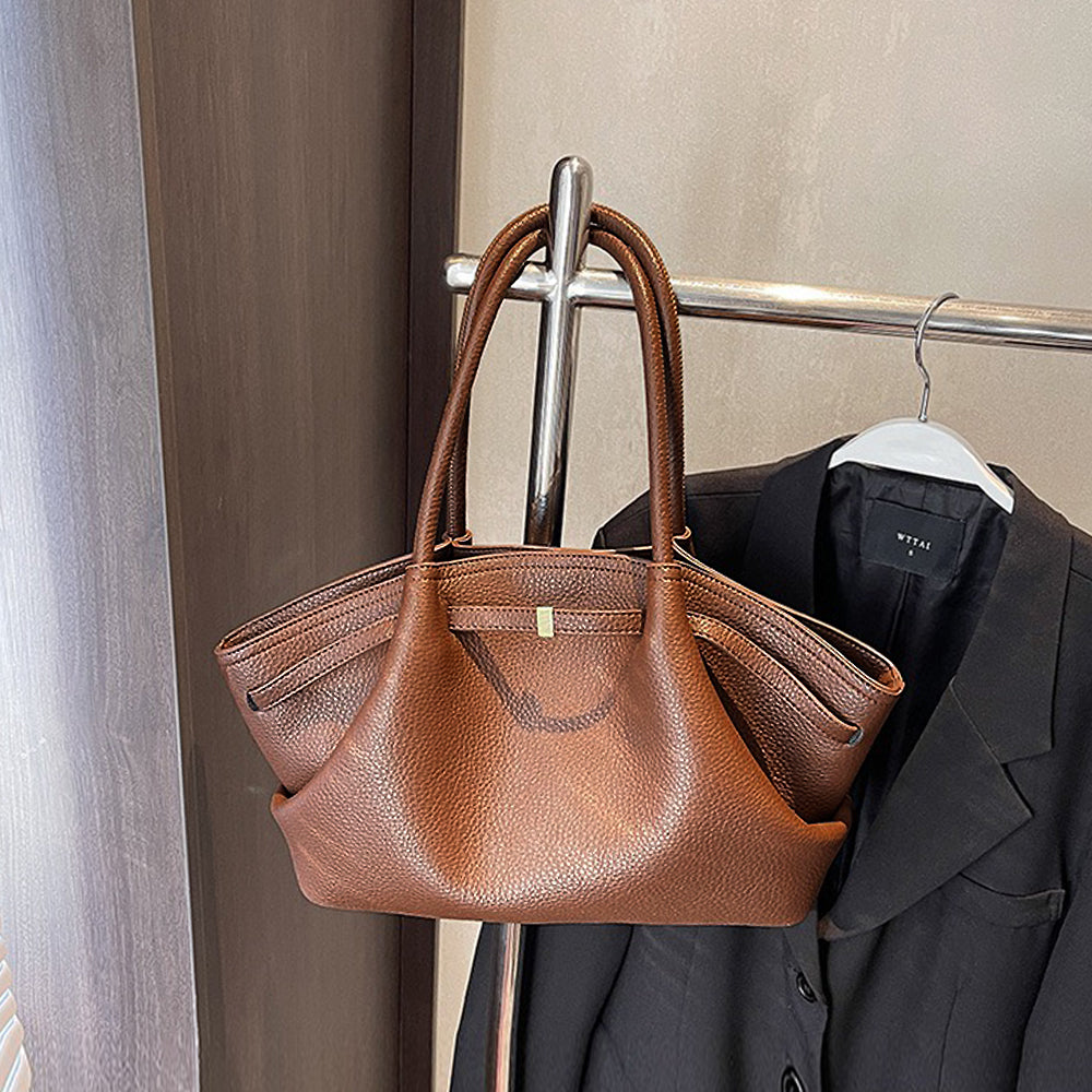tan tote handbag, tan slouchy, Modern structured tote, Work-to-weekend women’s bag, Understated luxury handbag, Best tote bag for busy women