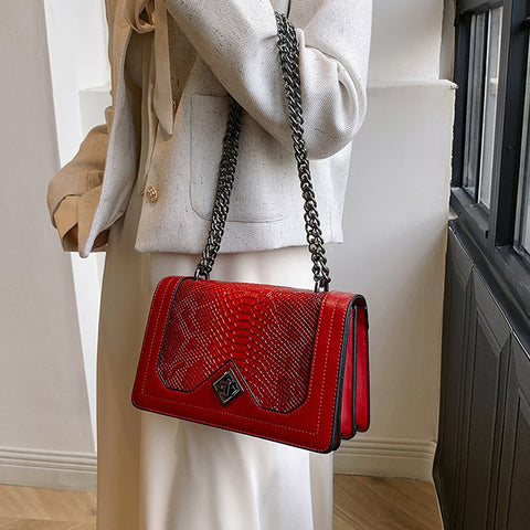 red shoulder bag with snakeskin texture, red faux leather bag with pattern, Elegant women’s handbag