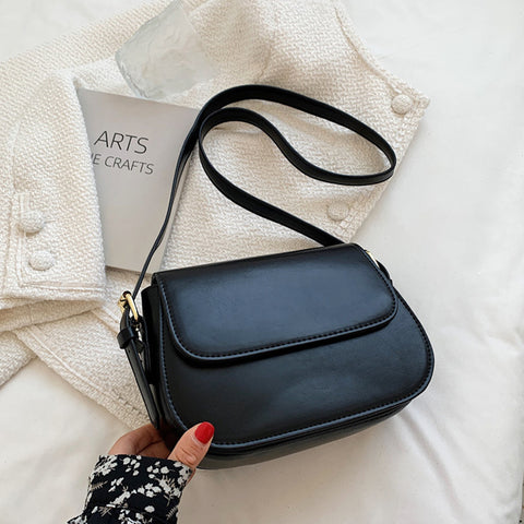 adjustable strap mini bag, lightweight mini purse for everyday use, everyday mini handbag women, black mini bag with adjustable strap, women's black shoulder bag