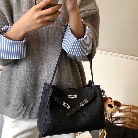 women's belted shoulder tote bag, women's fashion tote bag, women's belted shoulder tote bag in faux leather with charm, black tote bag, womens black tote bag