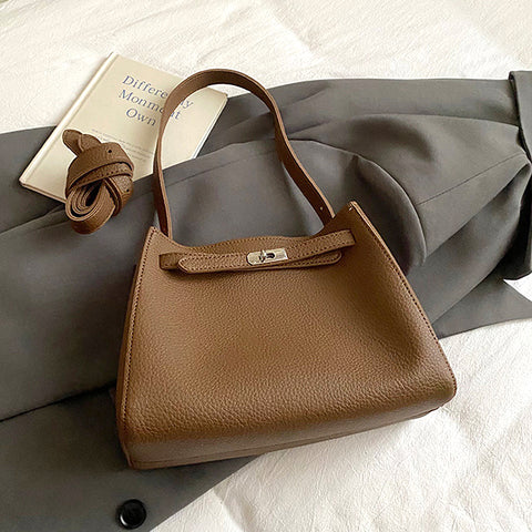 women's belted shoulder tote bag, women's fashion tote bag, women's belted shoulder tote bag in faux leather with charm, tan tote bag, womens tan tote bag