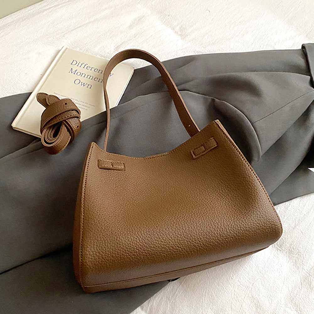 belted tote bag for women, everyday tote bag for women, fashionable women's tote bag for everyday use, tan tote bag with charm