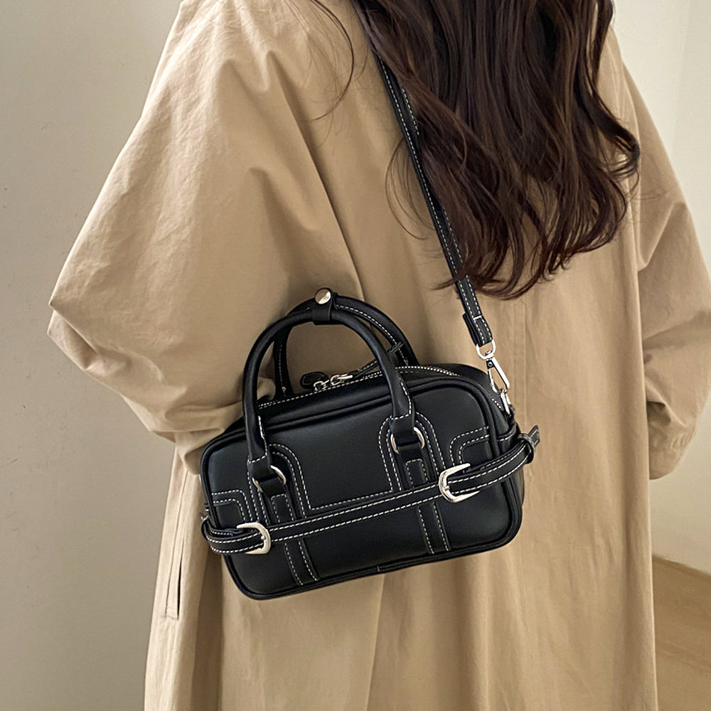 Black mini top handle zip up bag with crossbody strap