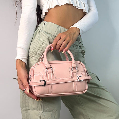 Pink mini top handle zip up bag with crossbody strap