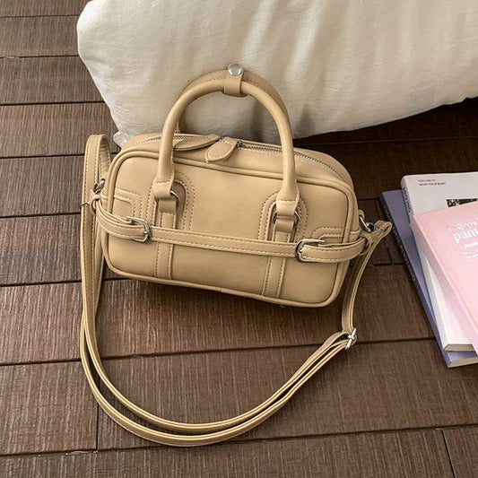 Taupe mini top handle zip up bag with crossbody strap