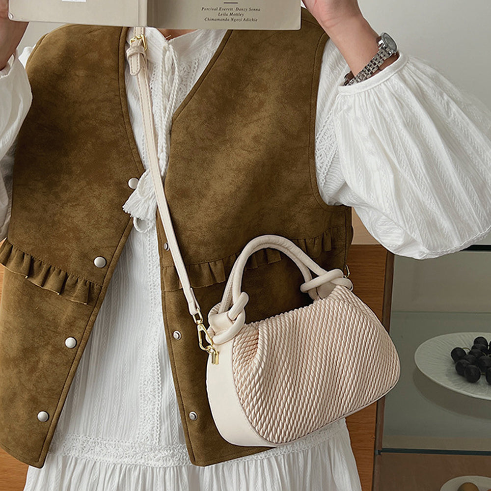 small beige crossbody bag