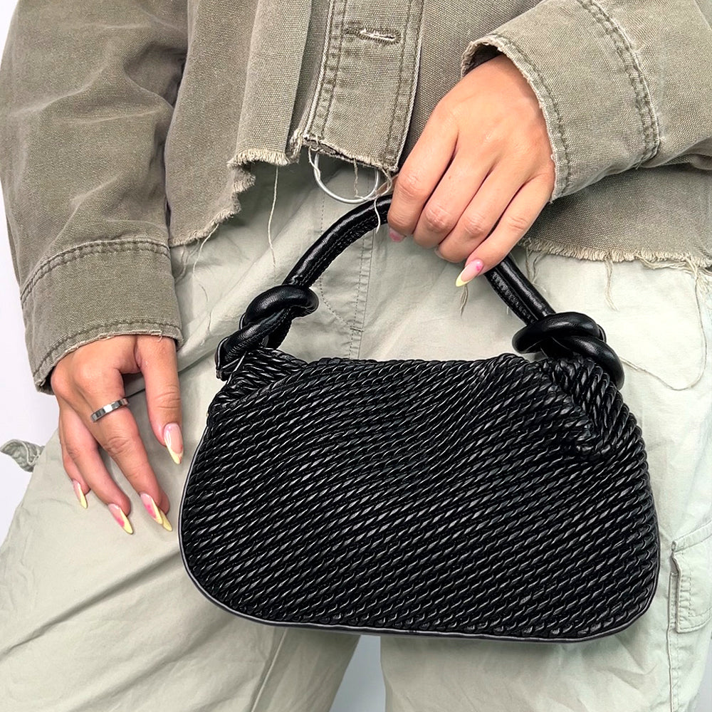 stylish black compact handbag for everyday essentials