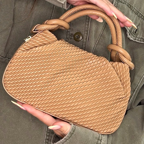 taupe woven mini bag with top handle and adjustable crossbody strap