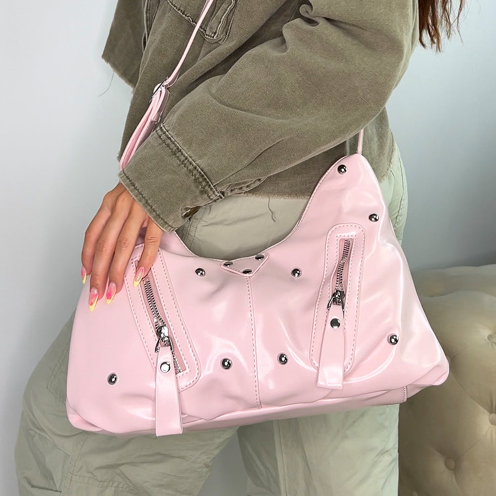 pink studded shoulder bag, pink shoulder bag with adjustable crossbody straps and studs