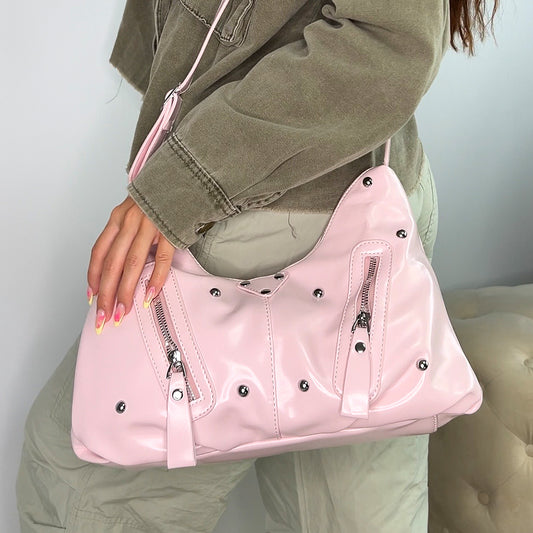 pink studded shoulder bag, pink shoulder bag with adjustable crossbody straps and studs