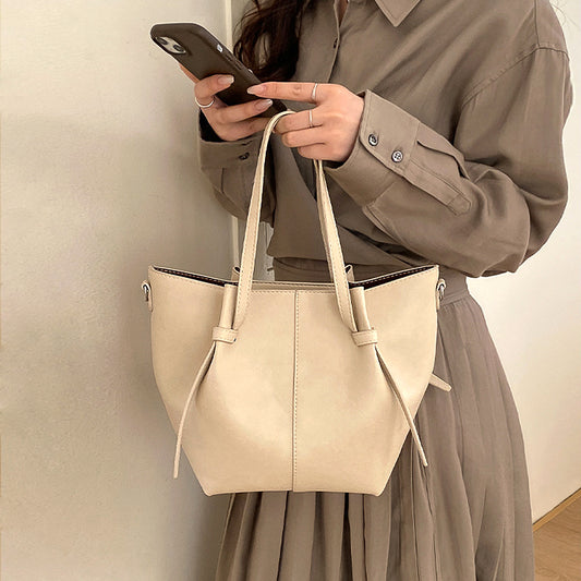 beige shoulder tote handbag with crossbody strap
