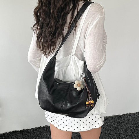 Black curved handbag, Black crescent purse with zip closure