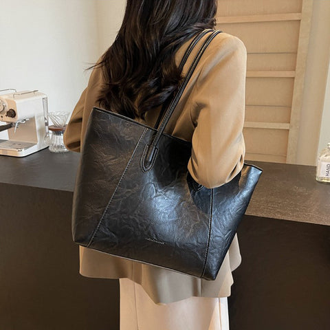 black handbag with faux leather material, black handbag for ladies