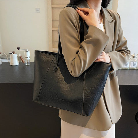 black leather handbag for work, black bag for women