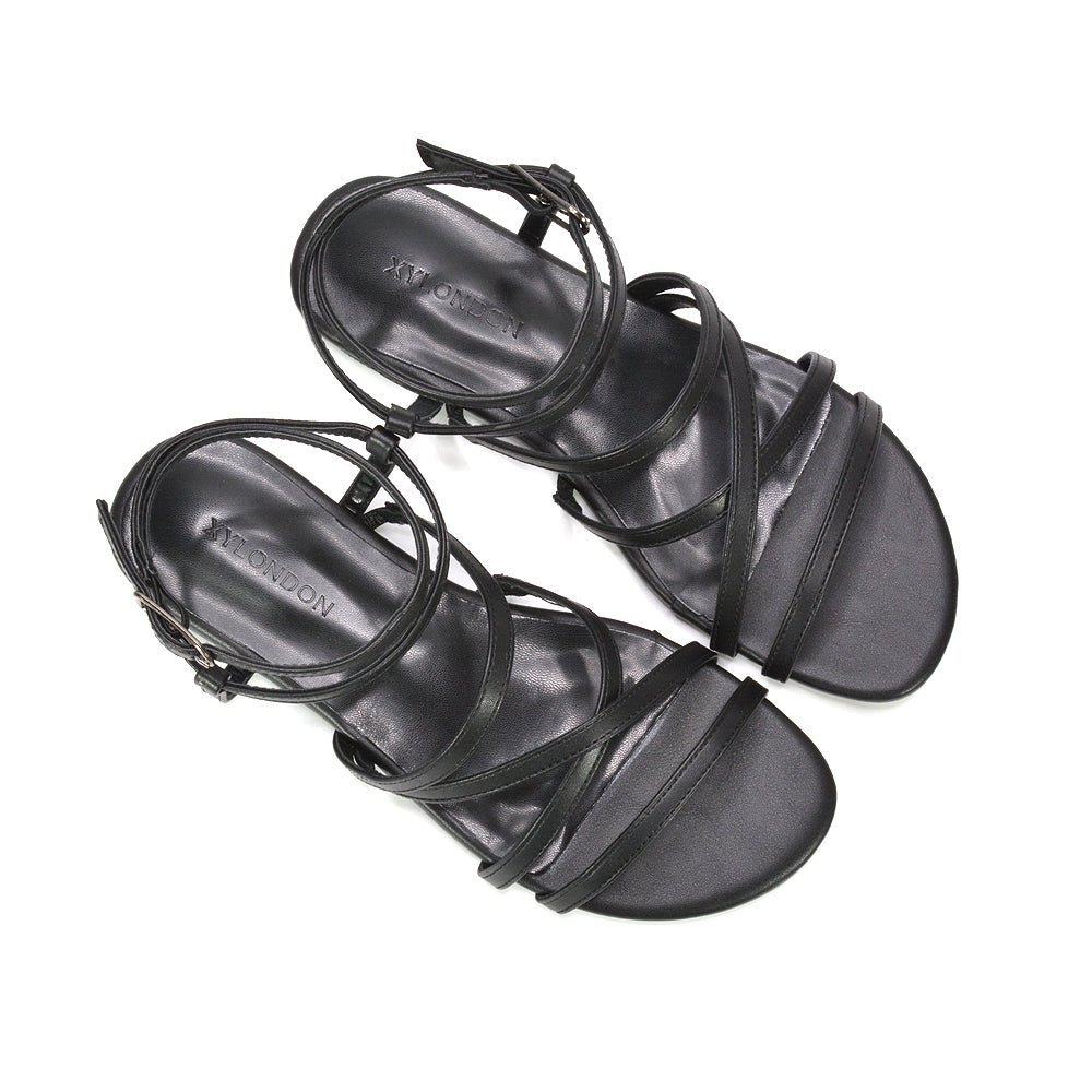 black flat sandals for women, casual black flat sandals for everyday wear, comfortable black sandals with ankle straps, black beach sandals for holiday outfits