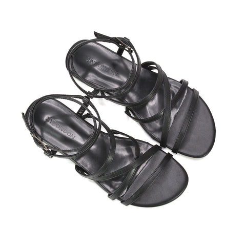 black flat sandals for women, casual black flat sandals for everyday wear, comfortable black sandals with ankle straps, black beach sandals for holiday outfits