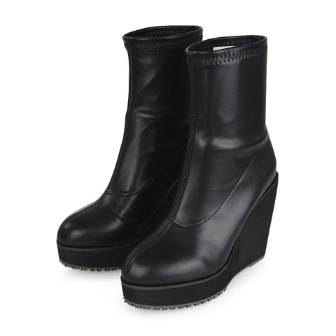 work-to-weekend boots, contemporary women’s boots, minimalist wedge ankle boots, wedge heel ankle boots, wedge ankle boots, women's ankle boots, womens boots, platform boots, sock ankle boots, sock boots heels, statement boots