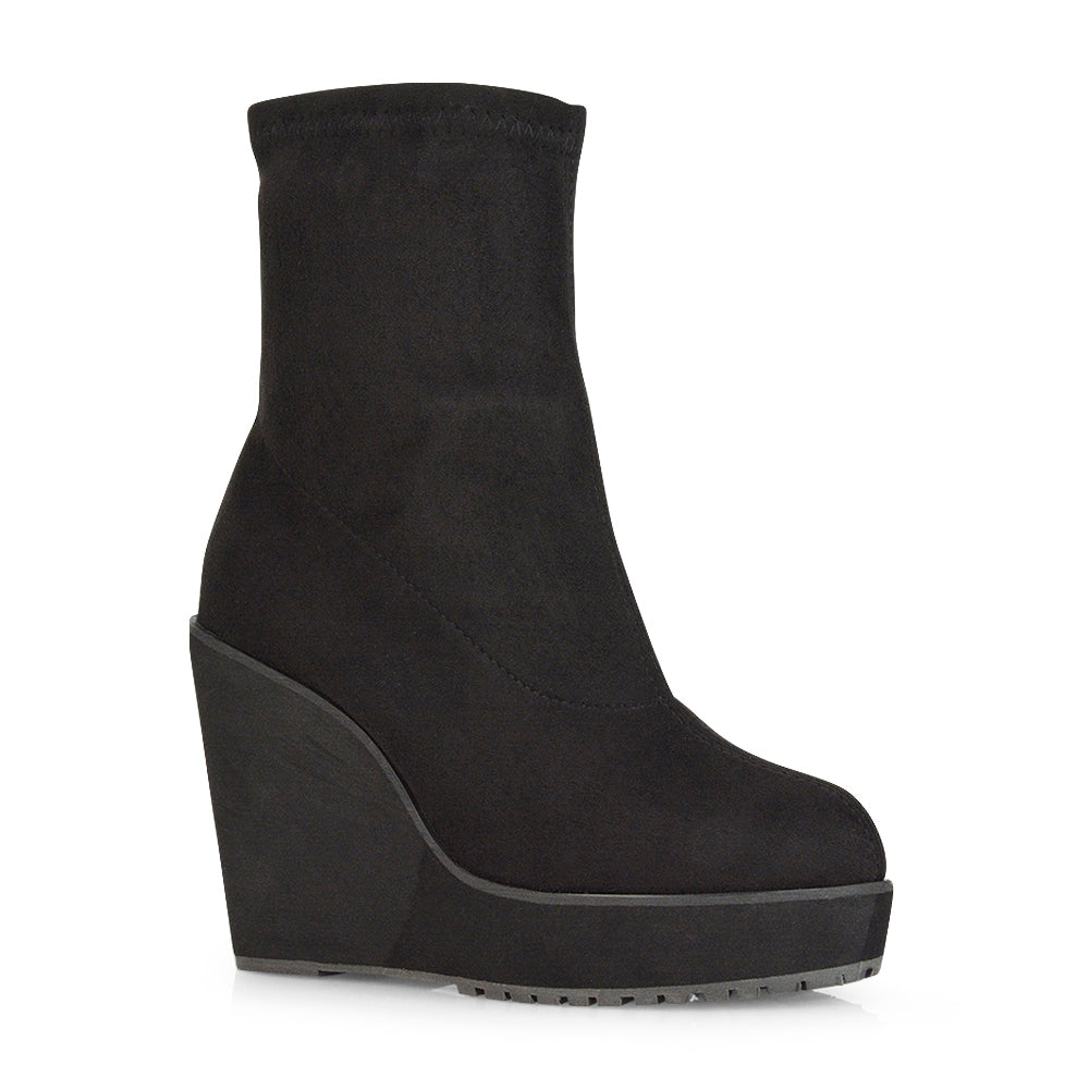 work-to-weekend boots, contemporary women’s boots, minimalist wedge ankle boots, wedge heel ankle boots, wedge ankle boots, women's ankle boots, womens boots, platform boots, sock ankle boots, sock boots heels, statement boots