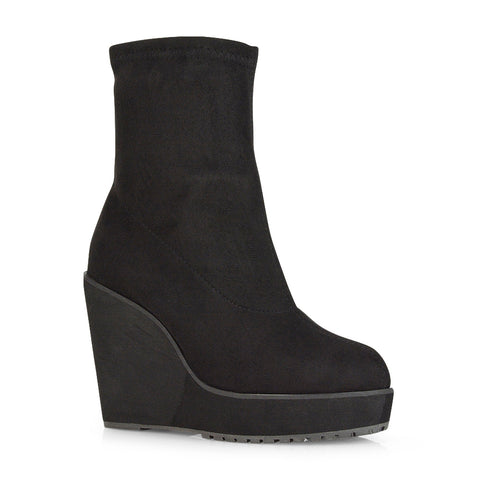 work-to-weekend boots, contemporary women’s boots, minimalist wedge ankle boots, wedge heel ankle boots, wedge ankle boots, women's ankle boots, womens boots, platform boots, sock ankle boots, sock boots heels, statement boots