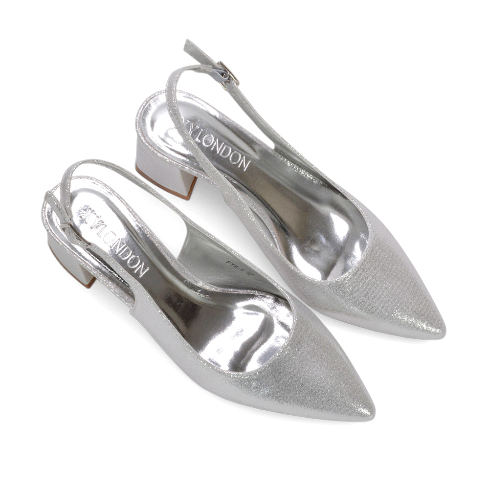 chic metallic mid heels, fashion-forward slingback pumps, elevated evening heels, textured shimmer fabric heels, holiday party block heels, silver party block heels, silver wedding guest heels