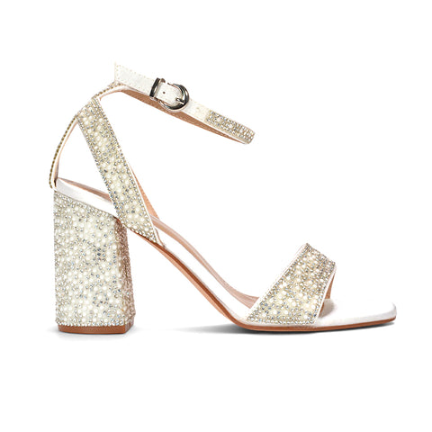 A single women's block-heel sandal covered in sparkling rhinestones, featuring a white ankle strap with a silver buckle and a square toe, shown against a plain white background.