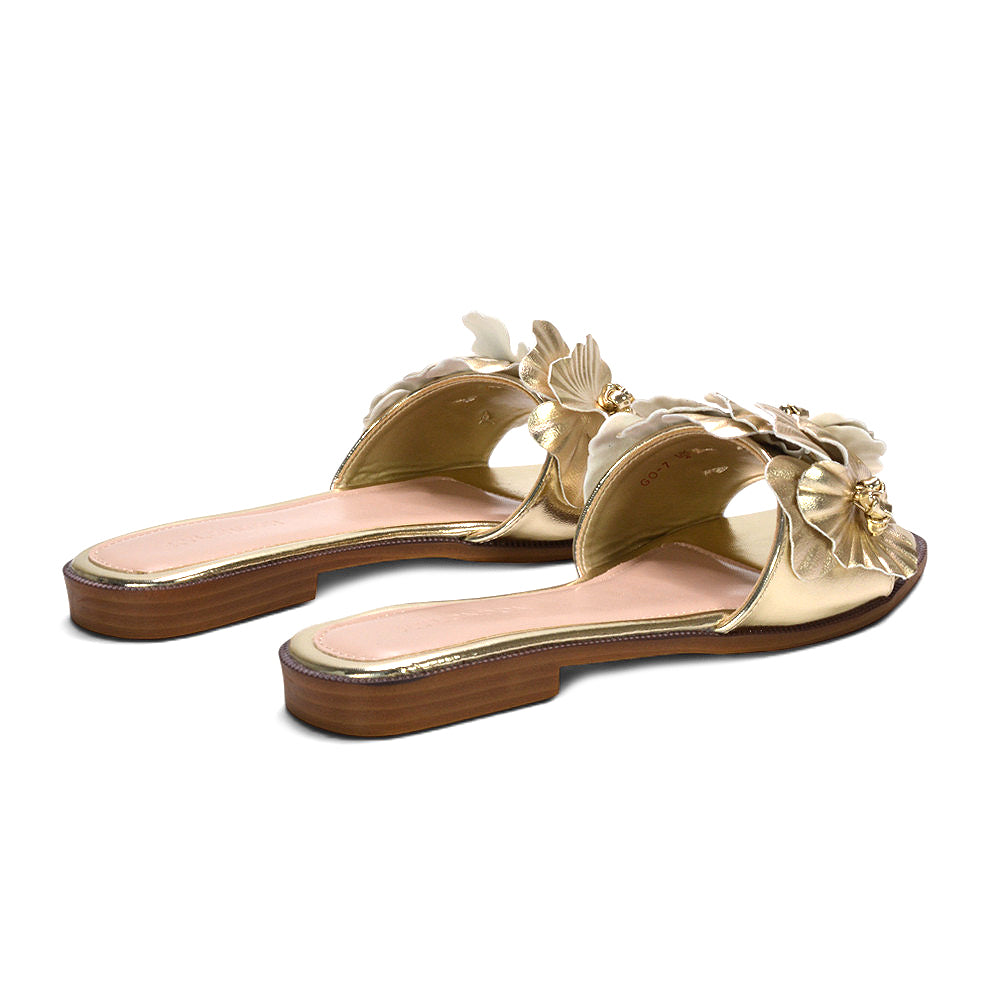 gold poolside slip on slides, metallic gold summer slides with flower embellishment, gold floral sandals, holiday sandals