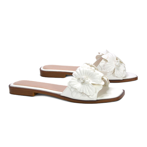 white open toe flats, white slip on flats with floral detail, white vacation outfit shoes