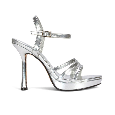 metallic silver platform heels for women, women’s silver stiletto platform sandals, silver strappy heels with tall platform sole, women’s shimmering silver high heel sandals
