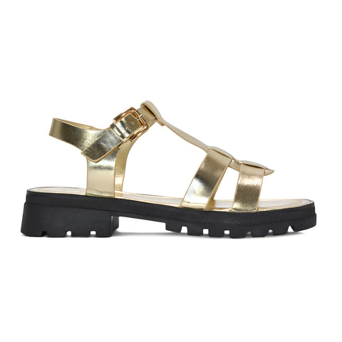 ankle buckle gladiator sandals, flat gladiator sandals with ankle strap, women’s gladiator sandals sale UK, boho chunky gladiator sandals, edgy platform sandals women, gold strappy sandals