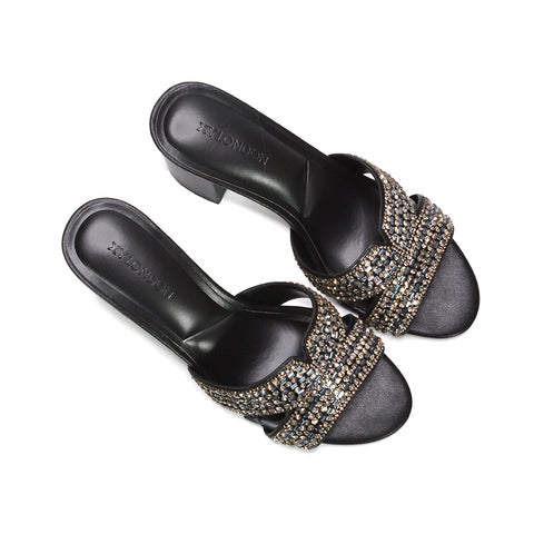 black glitter heels for night out, black holiday party heels, black wedding guest mule heels, black heeled mules
