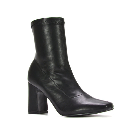 black heeled sock boots, black high heel boots, comfortable heeled boots, easy zip ankle boots, sleek ankle boots women, durable ankle boots, versatile ankle boots, transitional season boots, ankle boots side zip women