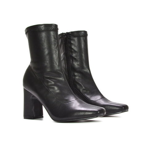 black block heel boots, black heeled boots, block heel boots, heeled boots, chunky heel ankle boots, cushioned sole ankle boots, closed toe ankle boots, easy on off boots women, smart casual ankle boots, classic women footwear, winter ankle boots women, best ankle boots for women, ankle boots side zip women