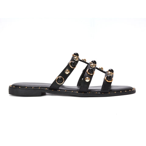 black slip on flat studded strappy sandals for women, edgy black studded strappy flat sandals women, black flat sandals for holiday evening outfits women, cushioned black flat slip on sandals for women, best black slip on flat strappy sandals for women