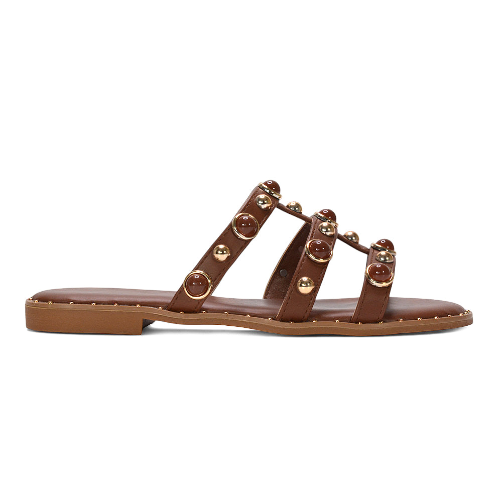brown slip on flat studded strappy sandals for women, tan brown bohemian studded flat sandals women, brown flat sandals for summer holiday outfits women, cushioned brown flat slip on sandals for women, best brown slip on flat strappy sandals for women
