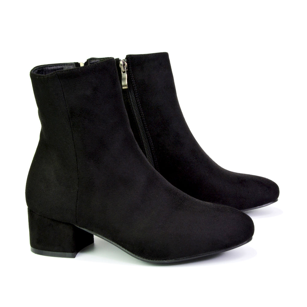 comfortable black Chelsea boots for everyday wear, black ankle boots with low heel and side zip, versatile black Chelsea style boots for women, women’s black casual low heel ankle boots