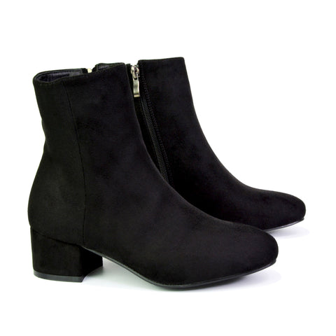 comfortable black Chelsea boots for everyday wear, black ankle boots with low heel and side zip, versatile black Chelsea style boots for women, women’s black casual low heel ankle boots