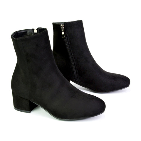 black Chelsea ankle boots with low block heel, comfortable black low heel ankle boots for women, stylish black zip up Chelsea boots for women, women’s black everyday Chelsea ankle boots