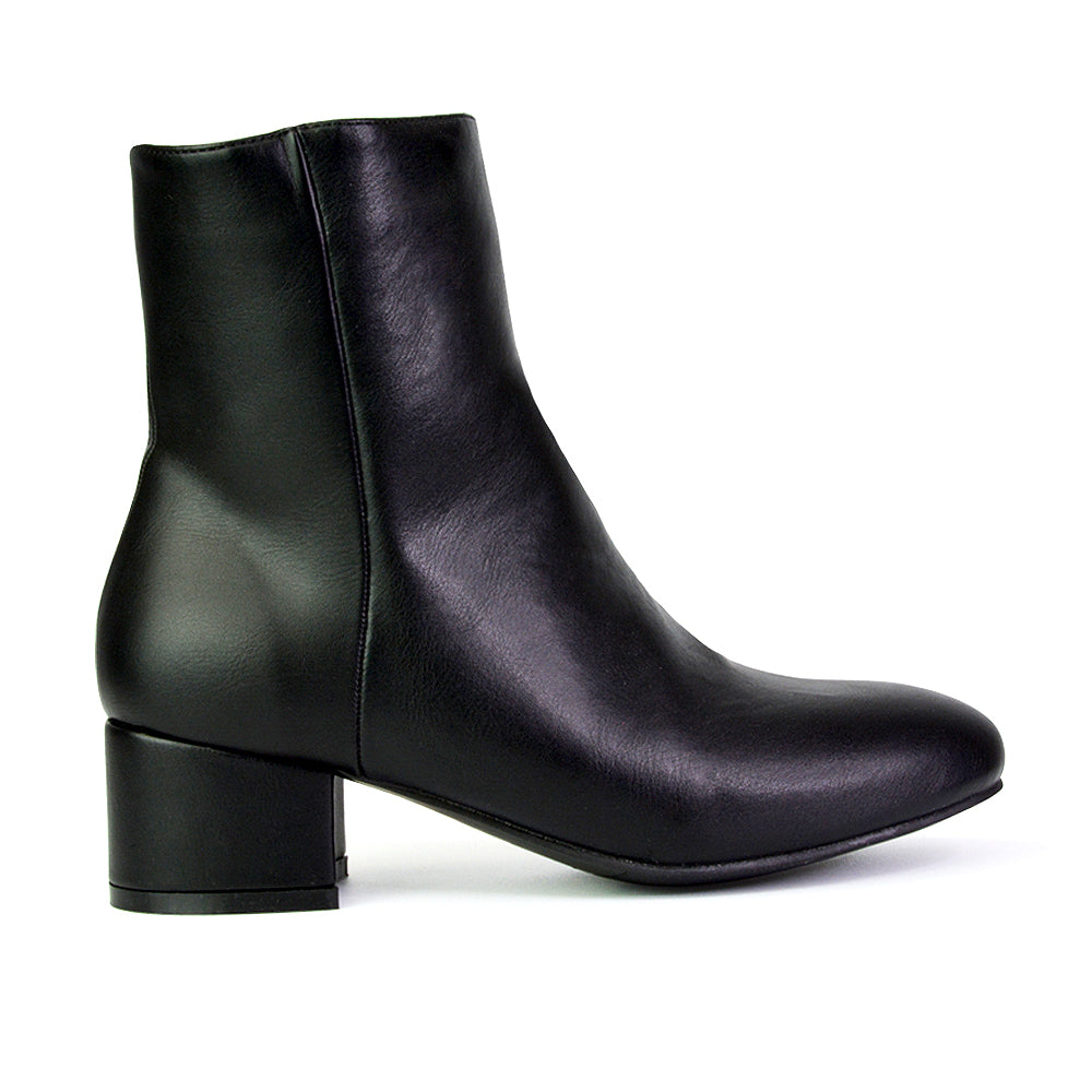 black low heel Chelsea boots with zip fastening for women, women’s black ankle boots low heel zip up, black women’s Chelsea boots with comfortable low heel, women’s black side zip Chelsea ankle boots
